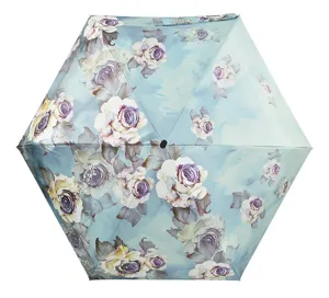 Detail view of compact six-fold mini oil painting floral umbrella, portable sun rain protection.