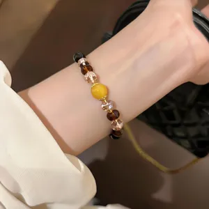 Retro crystal beaded bracelet for women, elegant brown tone jewelry chic accessory.