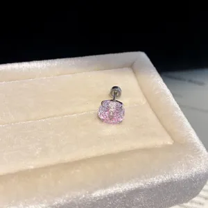 Close-up detail of sparkling pink zircon crystal stud earring featuring secure threaded back.