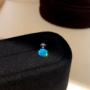 Detailed close-up showcasing the sparkling round blue cubic zirconia threaded stud earring.