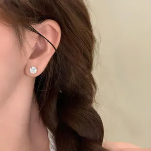 Minimalist round cubic zirconia stud earring detail, elegant daily wear fashion jewelry.