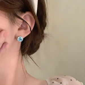 Elegant crystal stud earrings featuring a sparkling colorful zircon design for daily wear.