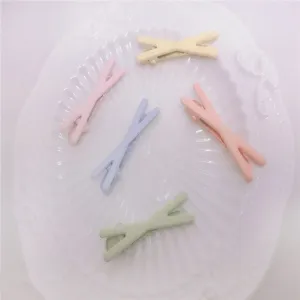 Cute pastel X-shaped hair clips with matte rubber finish, sweet colorful bangs side clips set.
