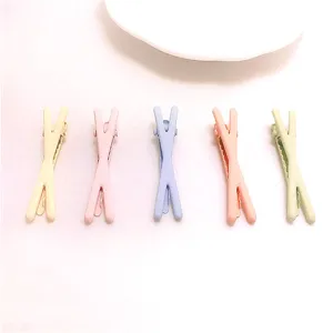 Cute pastel X-shaped hair clips for kids, matte rubber painted alloy side clips set.