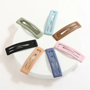 Set of 7 colorful matte square hair clips, soft-touch snap clips for women and kids daily hair styling.