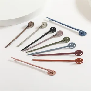 Colorful matte finish smiley face bobby pins set, cute hair clips for daily styling and kids.