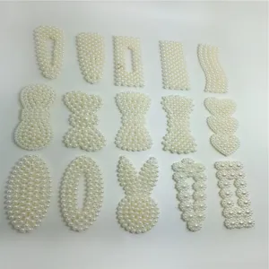 Set of assorted white faux pearl hair clips in various shapes, perfect for elegant daily hairstyles.