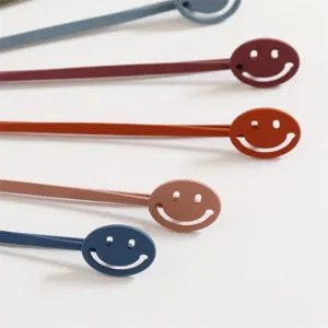 Colorful smiley face hair clips detail, matte touch paint bobby pins for daily styling.