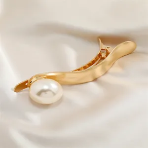 Elegant metal hair claw clip with large pearl accent, premium gold finish hair accessory for women.