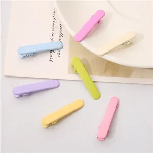 Mini pinzas para el cabello ovaladas de colores, horquillas metálicas sin marcas para niños.