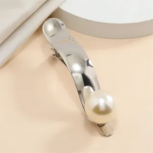 Elegant metallic hair clip with a large pearl detail, perfect for daily styling and accessorizing.