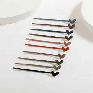 Colorful 7cm heart hair clips set, cute touch paint bobby pins for sweet daily styling.