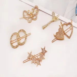 Gold rhinestone hair clips set, cute butterfly and star design hairpins for women styling.