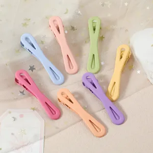 Macaron color metal duckbill hair clips detail view, smooth touch paint finish design.