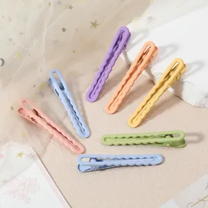 Colorful metal duckbill hair clips with wavy design and soft touch paint, macaron colors.