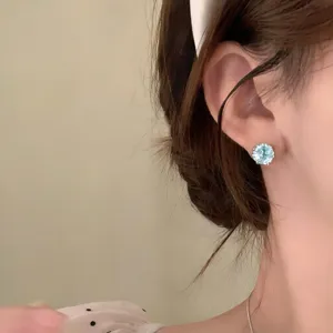 Korean style minimalist round blue zircon stud earrings, elegant daily jewelry accessory.