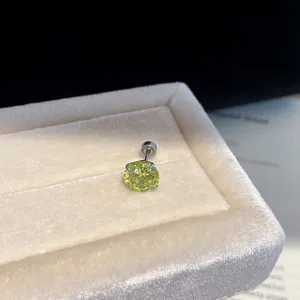 Detailed view of a stunning colorful round zirconia stud earring with threaded back, sparkling.