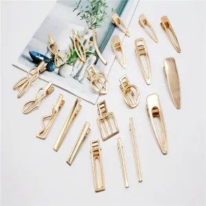Gouden metalen haarspangen set, geometrische holle eendebek clips en minimalistische accessoires.