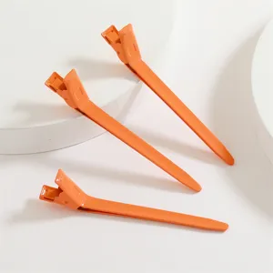 Hochwertige 9cm Aluminium Entenschnabel Haarklammern in Orange. Professionelles Styling.