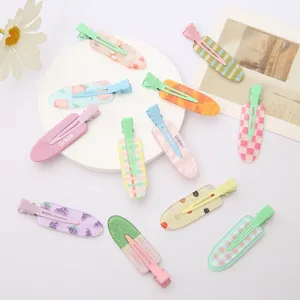 Acrylic hair clips detail view, colorful side clips with cute fruit and grid patterns for daily styling.