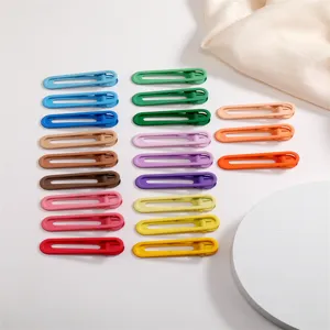 Detail view of colorful 6cm matte duckbill hair clips for sweet candy style bangs