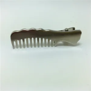 Detail shot of silver metal comb duckbill hair clip, stylish hair accessory for women.