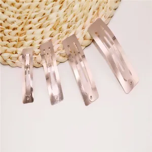 Set di 4 fermagli per capelli rettangolari in metallo di diverse misure accessori moda.