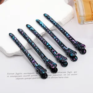 Detailed shot of 9.5cm colorful hair duckbill clips with stunning galaxy starry paint design.