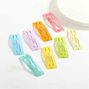Detailed view of 7cm matte pastel candy color snap hair clips for kids and DIY accessories.