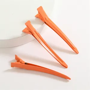 pince à cheveux bec de canard en aluminium 9cm orange outil coiffure frange détail