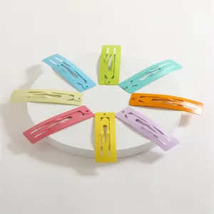 Detailed view of colorful 7cm matte finish metal snap hair clips set, perfect for kids and DIY hairstyles.