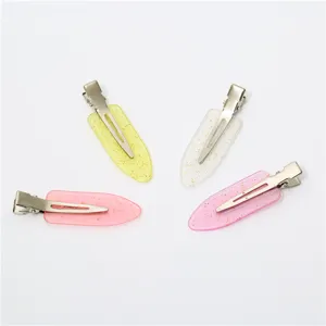 Detail view of 6cm candy color seamless hair clips with glitter, perfect for makeup and styling.