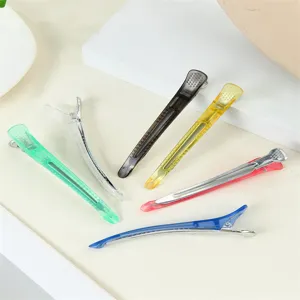 Pinzas para el pelo transparentes y coloridas para seccionamiento y peinado profesional.