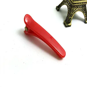 Red 5cm plastic duckbill hair clip for kids, cute mini hair accessories for daily wear.