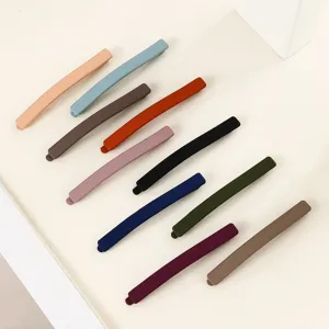Detailed view of colorful matte hair clips, minimalist design hair accessories, 6cm.
