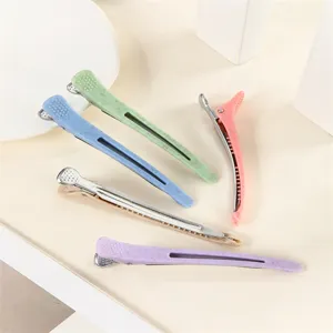 Detailed close-up view of colorful hair sectioning clips, non-slip duckbill clips for styling.