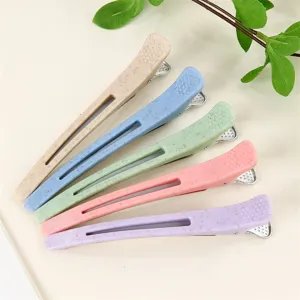 Close-up view of colorful hair sectioning clips with non-slip design, perfect for styling.