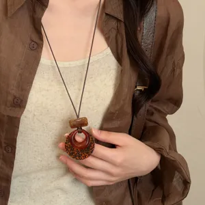 Vintage Leopard Acryl Anhänger lange Halskette, retro braune Kordel Pullover Kette für Damen.