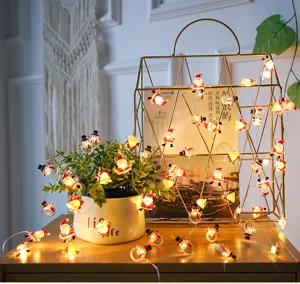 Guirnalda de luces LED de Navidad de alambre de cobre con adorables colgantes de Papá Noel.