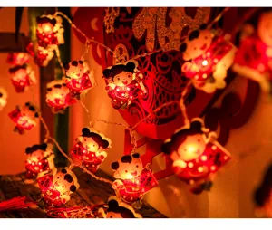 Catena luminosa LED Capodanno Cinese con simpatiche bambole per illuminazione festiva interna.
