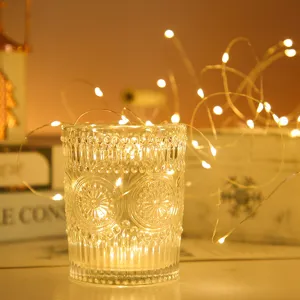 Catena luminosa LED in filo di rame con bicchiere decorativo, calda luce per la casa.