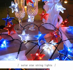 Guirnalda de luces solares de estrella rojo blanco azul para decoración de jardín.