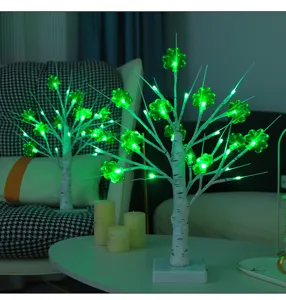 St. Patrick's Day green LED four leaf clover tree light for Irish festival decor.