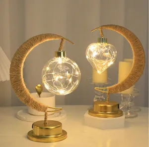 Lampada da tavolo decorativa LED luna in corda di canapa con lampadina di vetro luminosa sospesa.