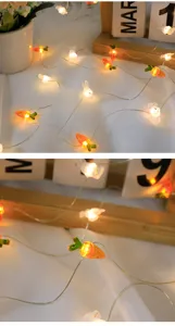 Dettaglio stringa di luci LED carota coniglio, luci decorative calde per feste e casa.