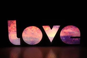 Detailed view of the LED LOVE marquee letter light with colorful galaxy pattern for romantic decor.