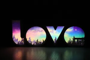 Close-up detail of the romantic LOVE letter LED night light with starry galaxy pattern.