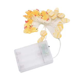 Catena luminosa LED pasquale in filo di rame con simpatici pulcini e uova per feste e decorazioni.