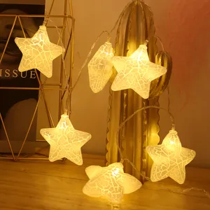 Catena luminosa LED stelle crepate dettaglio, bellissime luci calde per decorazione natalizia e camera.