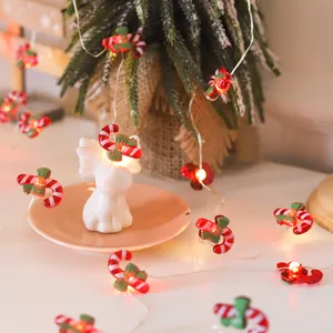 Guirnalda de luces LED navideñas con bonitos colgantes de bastón de caramelo para decoración.